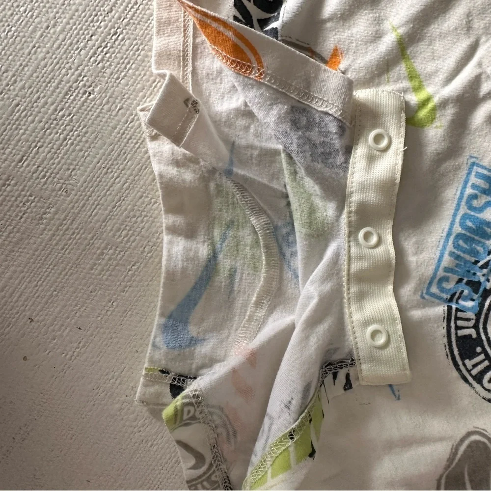 Nike White Romper with Colorful Graphic Print